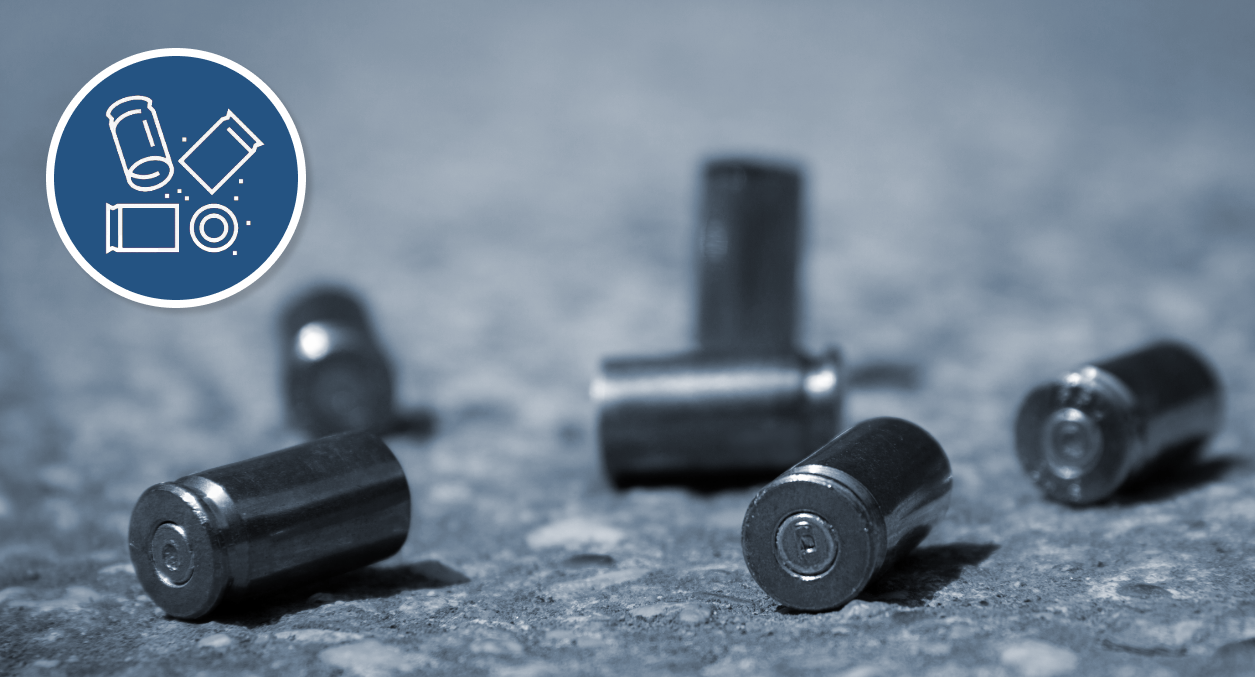 Photo of shell casings on the ground. Also an icon of shell casings.