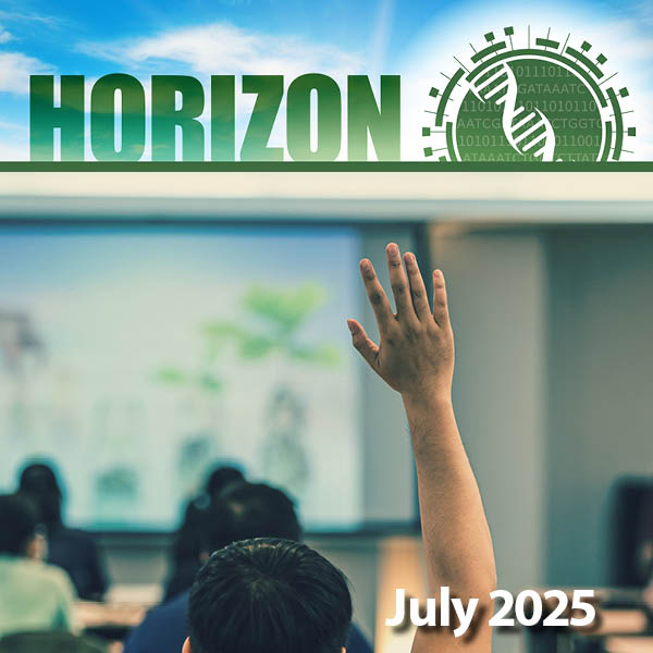 Close up on a raised hand in a classroom setting
